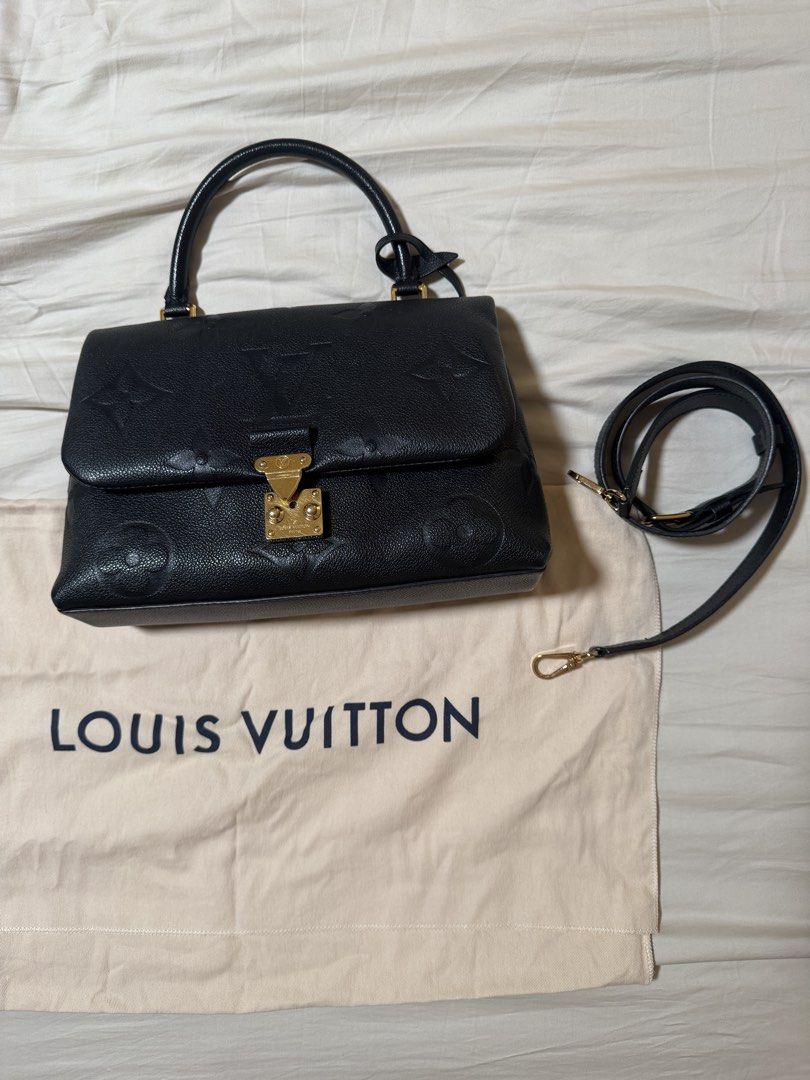 LV Madeleine MM Monogram Empreinte (Category: Luxury Bags & Wallets) located in Manila. Submitted by kiiimsantos (Listing ID 1436041071, Image 2). Description: Bought in Dubai last 2022 Complete with dustbag, box & paperbag RFS: Clean-up Meet-up: BGC area .