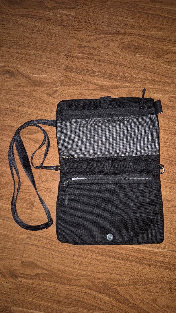MAGEASY Cordura Sling Bag (Category: Sling Bags) located in Valenzuela. Submitted by 0105pml (Listing ID 1436013465, Image 3). Description: BOUGHT IN TAIWAN AIRPORT - Black Cordura sling bag - Zippered main compartment - Adjustable shoulder strap - Multiple internal compartments - Ideal for phone, wallet, and small items - Compact and suitable for daily use.