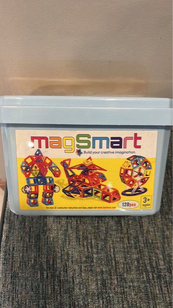 MagSmart Magnetic Tiles 120pcs (Category: Educational & Learning Toys) located in Quezon City. Submitted by krisallie (Listing ID 1435991843, Image 1). Description: - MagSmart Magnetic Tiles Set with 120 pieces - Includes various shapes: squares, triangles, hexagons, and more - Comes with a convenient storage container - Suitable for ages 3+ - Features wheels and other accessories for building - Box shows examples of structures you can build.