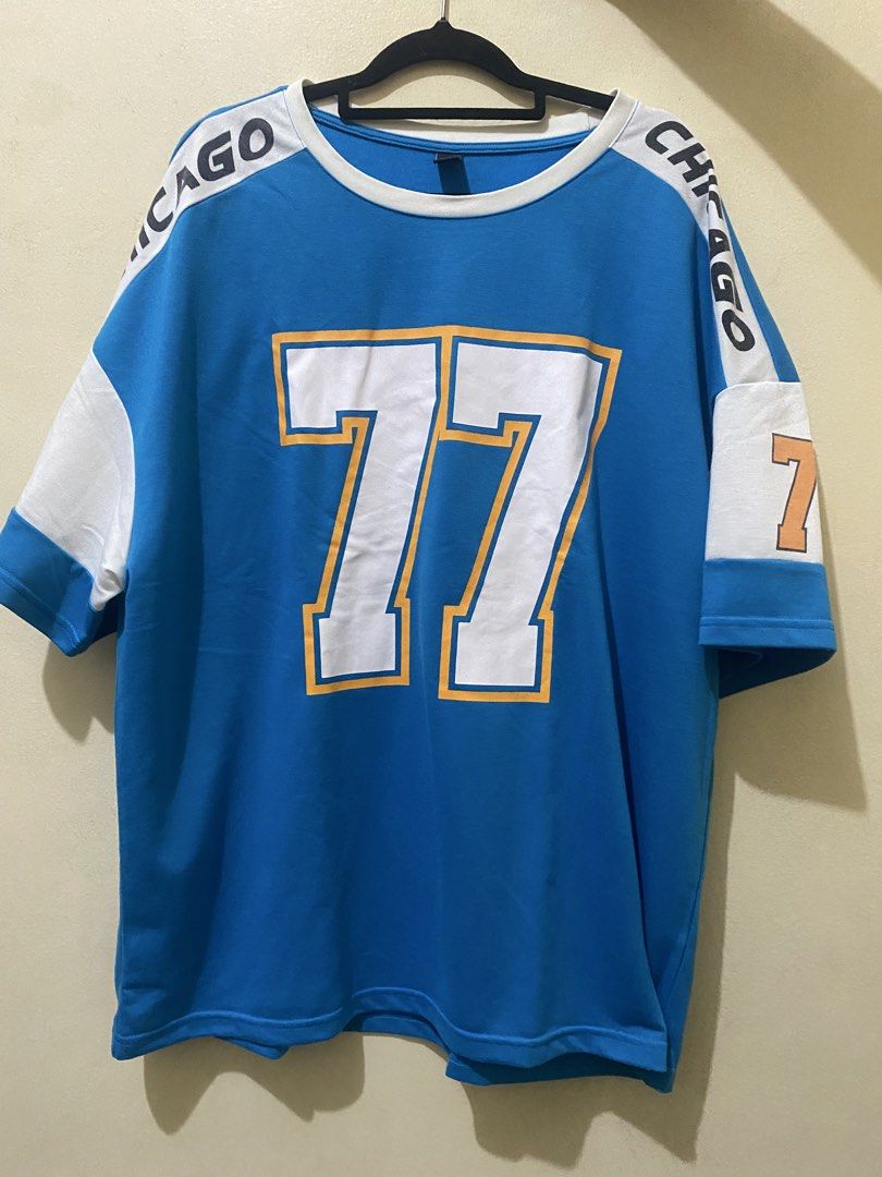 Manfinity Chicago 77 Oversized T-shirt XL (Category: Tshirts & Polo Shirts ) located in Manila. Submitted by ynoshiko (Listing ID 1435951331, Image 2). Description: - Oversized blue t-shirt - Brand: Manfinity - Size: XL - Design: White and orange accents with "77" and "CHICAGO" print - Features: Crew neck, short sleeves - Material: Lightweight fabric RFS: Doesn't fit, it's too tight for me Size: Small but it can fit to XS MOP: Gcash/Gotyme Please