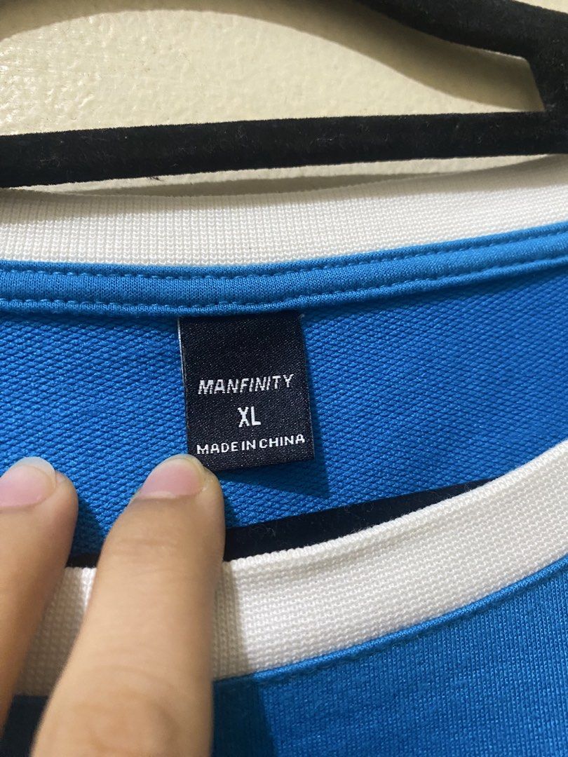 Manfinity Chicago 77 Oversized T-shirt XL (Category: Tshirts & Polo Shirts ) located in Manila. Submitted by ynoshiko (Listing ID 1435951331, Image 3). Description: - Oversized blue t-shirt - Brand: Manfinity - Size: XL - Design: White and orange accents with "77" and "CHICAGO" print - Features: Crew neck, short sleeves - Material: Lightweight fabric RFS: Doesn't fit, it's too tight for me Size: Small but it can fit to XS MOP: Gcash/Gotyme Please
