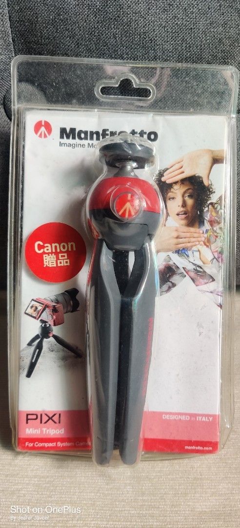 Manfrotto PIXI Mini Tripod (Category: Tripods & Monopods) located in Itogon. Submitted by garage_mixdeclutter (Listing ID 1435927933, Image 1). Description: - Manfrotto PIXI mini tripod - Stylish red and black design - Made in Italy - Compatible with Canon cameras - Compact and portable for easy carrying - Ideal for stable photos and videos.
