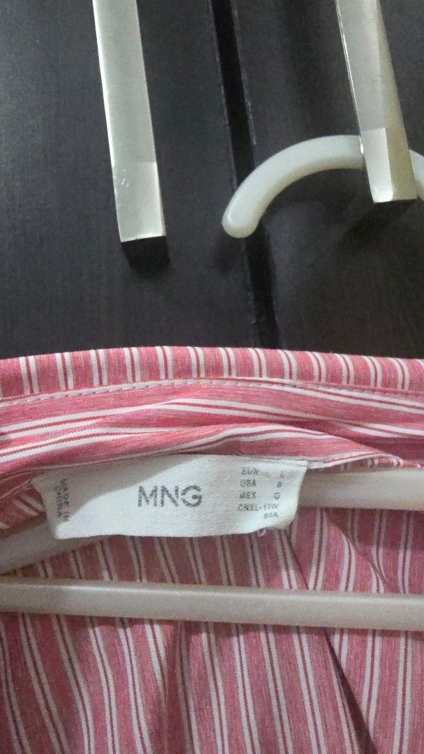 Mango Striped Polo Shirt (Category: Shirts) located in Manila. Submitted by steffi.declutters (Listing ID 1436045938, Image 3). Description: - Mango striped shirt - Collared neckline - Button-down closure - Short sleeves - Single chest pocket - Size available on tag - Suitable for various occasions.
