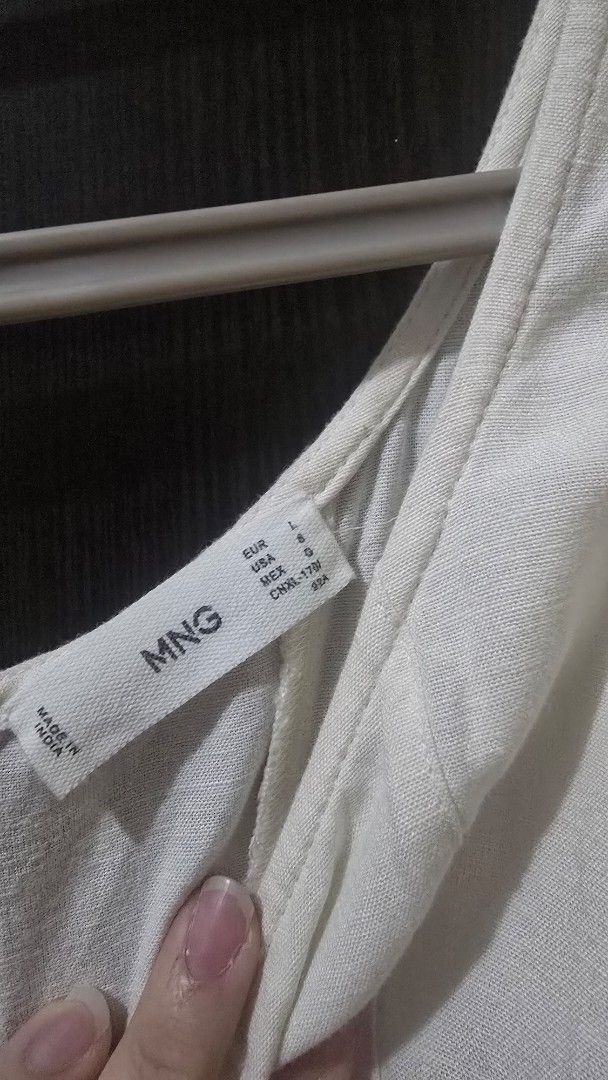Mango White Mini Dress (Category: Sleeveless) located in Manila. Submitted by steffi.declutters (Listing ID 1436054283, Image 3). Description: - Mango white top - Size: L - Features: Short sleeves, scoop neck - Color: White - Fabric: Lightweight - Made in India.