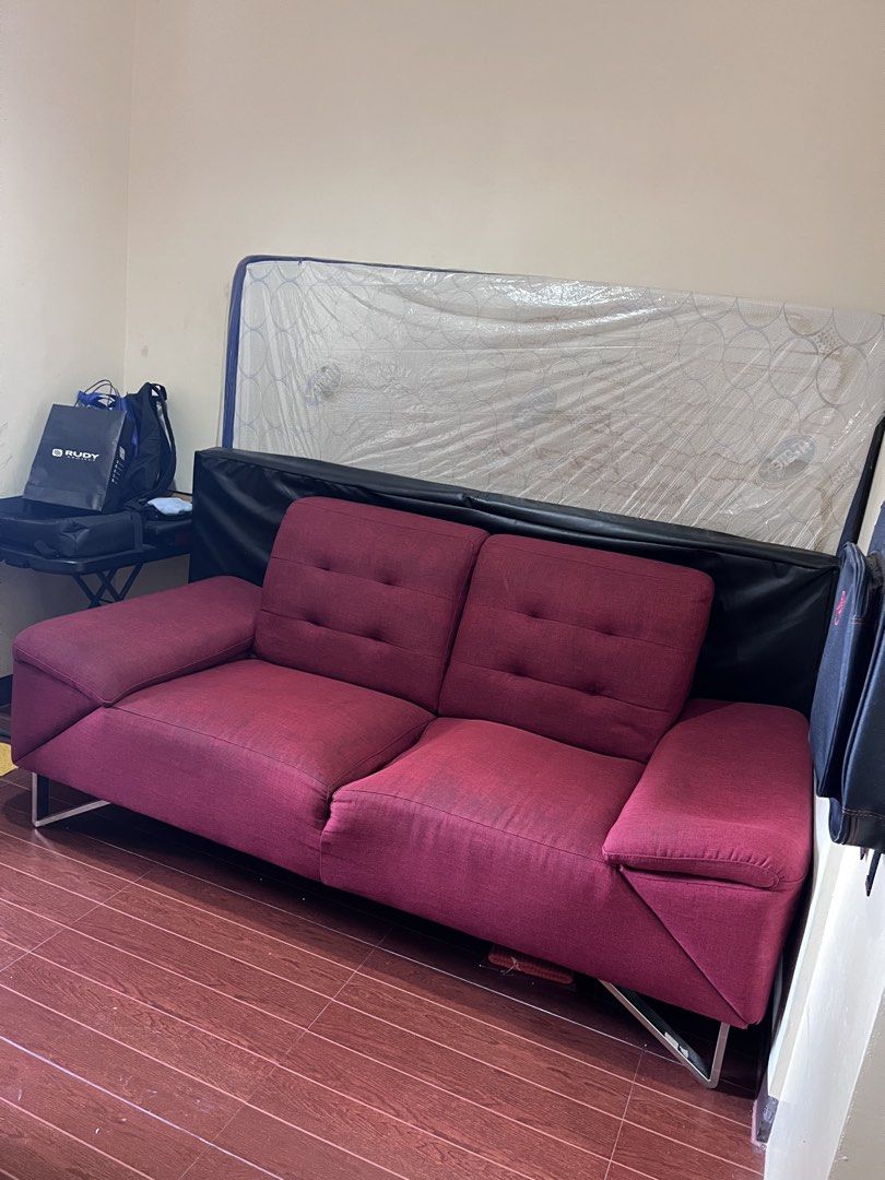 Maroon 2-Seater Sofa with Metal Legs (Category: Sofas) located in Paranaque City. Submitted by addcunanan (Listing ID 1436076596, Image 1). Description: Premium 2-Seater Sofa – Metal Legs (Maroon) Bought for ₱26,950 • Modern maroon 2-seater sofa • Very soft and comfortable (8/10 condition) • Tufted backrest and armrests • Sturdy metal legs • Space-saving, ideal for condos or small spaces • Dimensions (approx.): 183 cm (L) × 117 cm (W) × 54 cm (se
