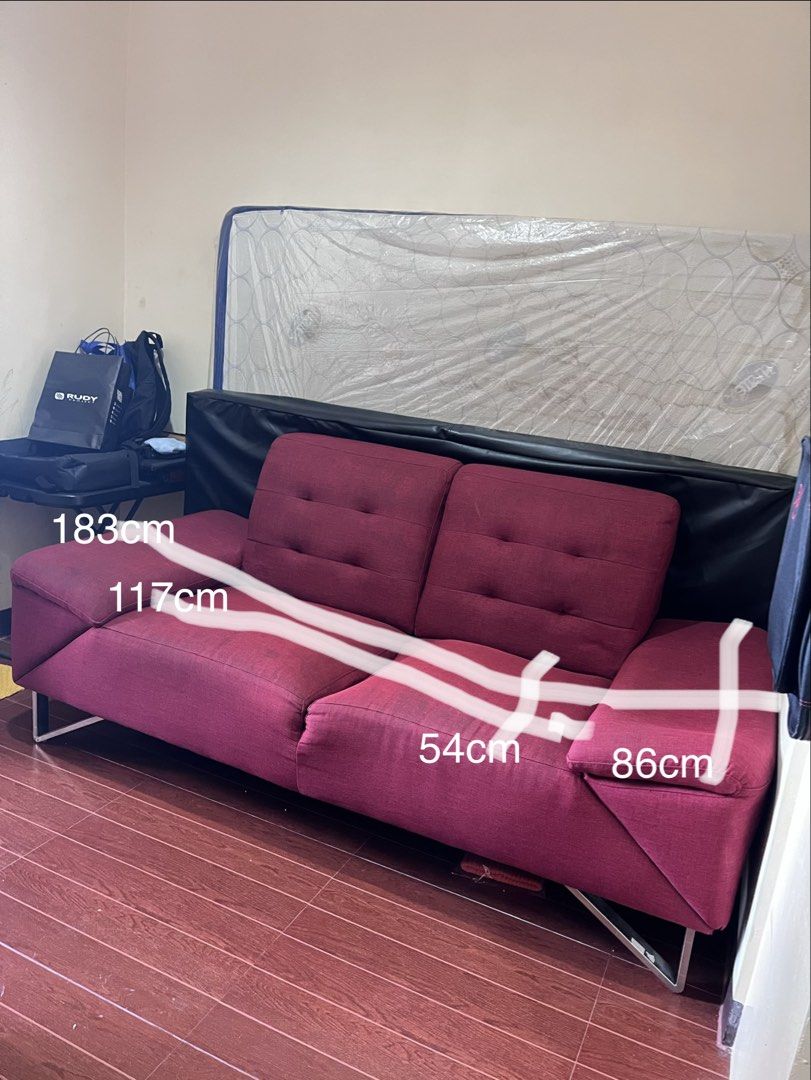 Maroon 2-Seater Sofa with Metal Legs (Category: Sofas) located in Paranaque City. Submitted by addcunanan (Listing ID 1436076596, Image 2). Description: Premium 2-Seater Sofa – Metal Legs (Maroon) Bought for ₱26,950 • Modern maroon 2-seater sofa • Very soft and comfortable (8/10 condition) • Tufted backrest and armrests • Sturdy metal legs • Space-saving, ideal for condos or small spaces • Dimensions (approx.): 183 cm (L) × 117 cm (W) × 54 cm (se