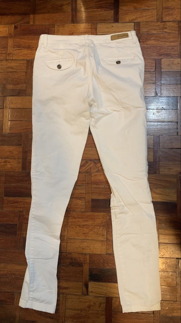 Max White Pants UK 10 EUR 36 (Category: Other Bottoms) located in Manila. Submitted by fiercebird-acdf21 (Listing ID 1435946727, Image 2). Description: - Max white pants - Size: UK 10 / EUR 36 - Button and zipper closure - Two back pockets - Neutral color, easy to match.