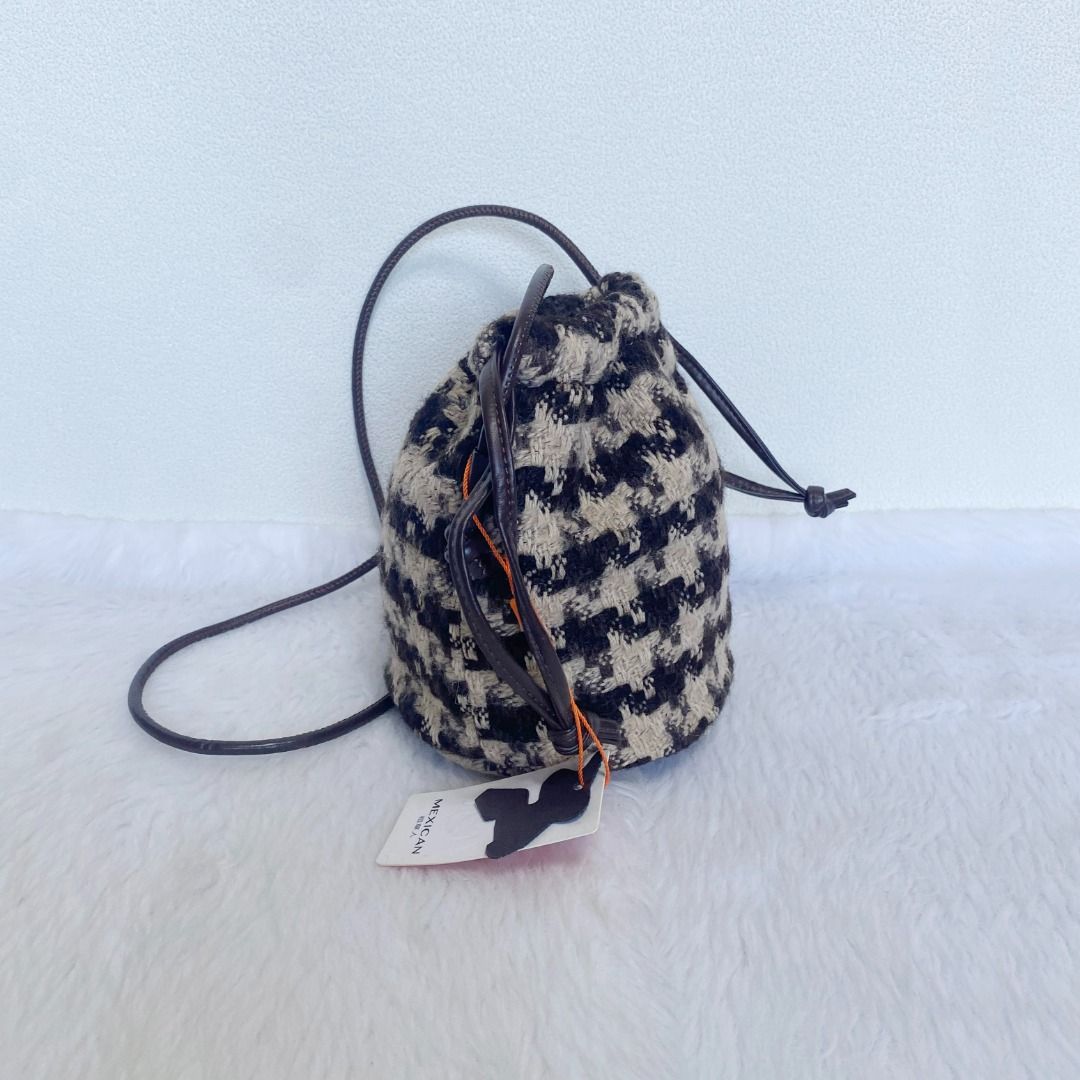 Mexican Black Ivory White Wool Bucket Bag (Category: Cross-body Bags) located in Cebu City. Submitted by posh_avenue888 (Listing ID 1436031744, Image 2). Description: Brand new. From Japan. Crafted in wool fabric. 100% authentic!!! 5.5" x 7" x 5.5"..