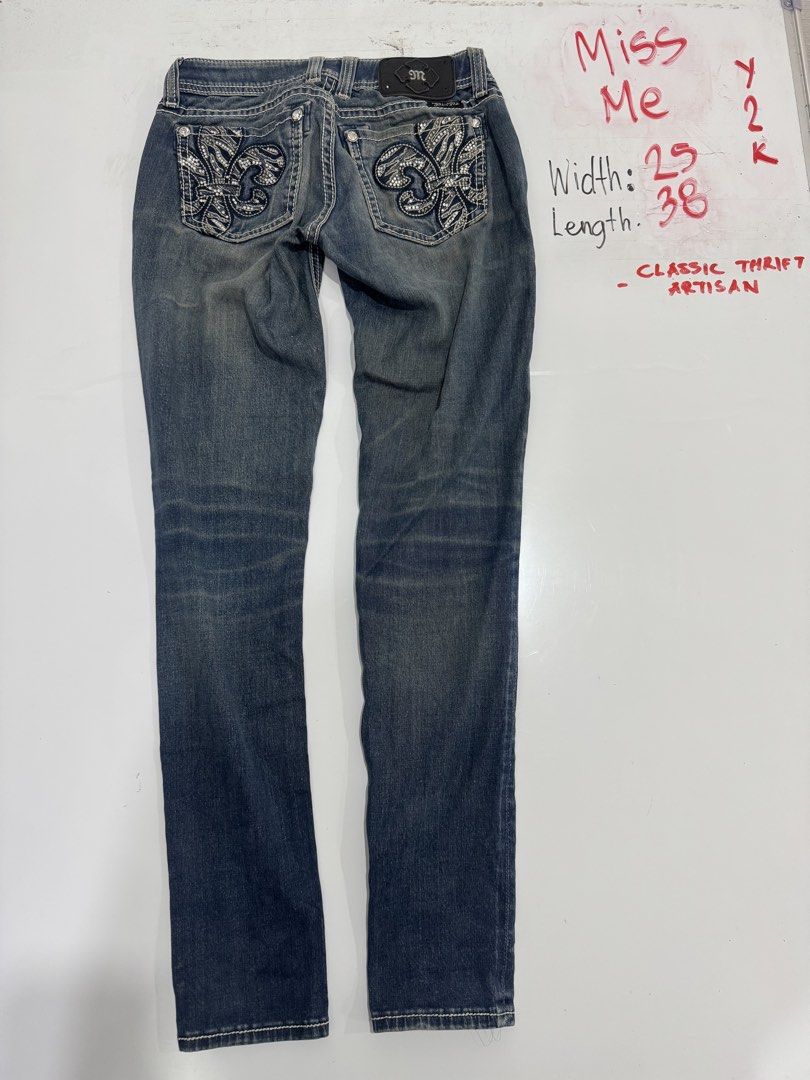 Miss Me Y2K Jeans Size 25 (Category: Jeans) located in Cebu City. Submitted by oryenz (Listing ID 1436040439, Image 1). Description: - Miss Me Y2K jeans - Size 25 waist - 29" width, 38" length - Slightly faded denim wash - Embellished back pockets - Button and zipper closure.