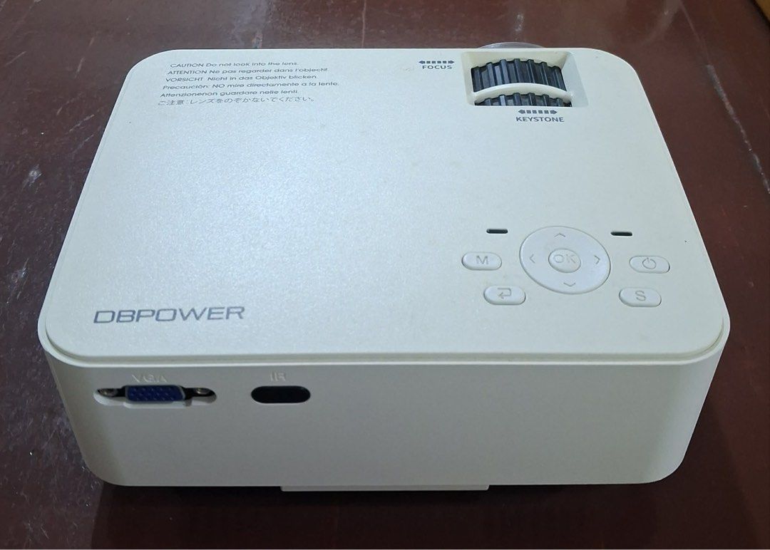 Multi-media mini projector (Category: Projectors) located in Pasig City. Submitted by stelala19 (Listing ID 1435973711, Image 1). Description: New DBPOWER T20 Multimedia Mini Projector. Features 1500 lumens brightness and utilizes LCD technology for home theater use. Supports up to 1080P Full HD. Equipped with HDMI, USB, SD Card, VGA, and AV ports. Designed for portability, making it suitable for creating a home theater experience anywhere. Shpg 