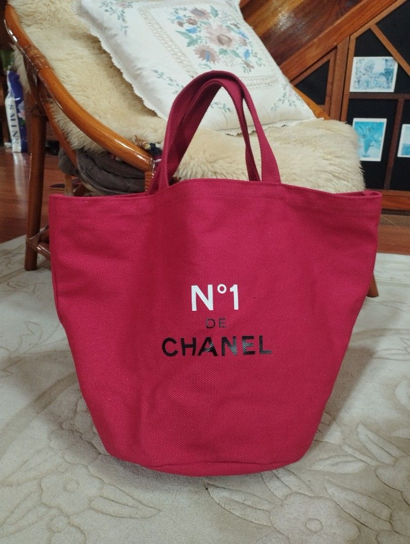 N 1 de Chanel Cotton Tote Bag (Category: Luxury Bags & Wallets) located in Baguio. Submitted by katgon2016 (Listing ID 1435973427, Image 2). Description: CHANEL N°1 Tote Bag Cotton Red Camellia 45 x 30 x 25 cm Novelty Bag rounded bottom spacious- fits folding umbrella, shawl, etc. brand new price on ebay USD 499.