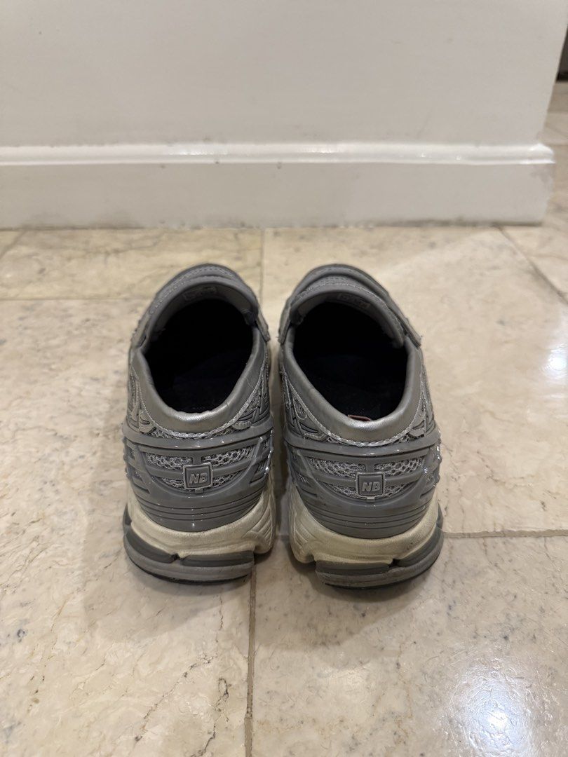 New Balance 1906L Loafer Silver (Category: Sneakers) located in Pasig City. Submitted by andre_suarez (Listing ID 1436044980, Image 3). Description: - New Balance 1906 Loafer sneakers - Silver colorway - Mesh upper with metallic overlays - Loafer style design - Black rubber sole with off-white midsole - New Balance logo on heel - Strap across the top - Minor wear on soles - Complete local pair - US 9.