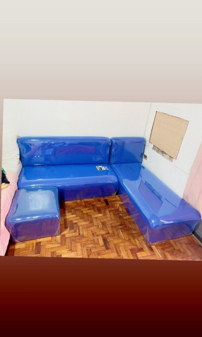 New L-Type Sofa (Category: Sofas) located in Manila. Submitted by swiftmoon.a6f74e (Listing ID 1436001094, Image 1). Description: - Brand new L-type sofa set - Features durable Uratex foam - Stylish blue color - Includes a matching ottoman - Still in original plastic wrap - Original price: PHP 16,500 - Great deal! Size: LxWxH 56x22x12 48x24x12 22x17x12.
