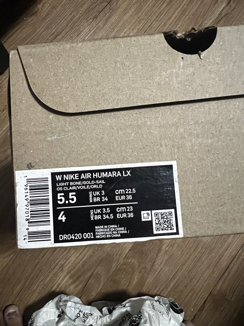Nike Air Humara LX Jacquemus (Category: Sneakers) located in Manila. Submitted by binigurrl (Listing ID 1436044829, Image 3). Description: - Nike Air Humara LX sneakers - Colorway: Light bone/gold-sail - Size: US 5.5, UK 3, EUR 36, 22.5 cm - Features white and beige design with black accents - Includes original box with Jacquemus logo.