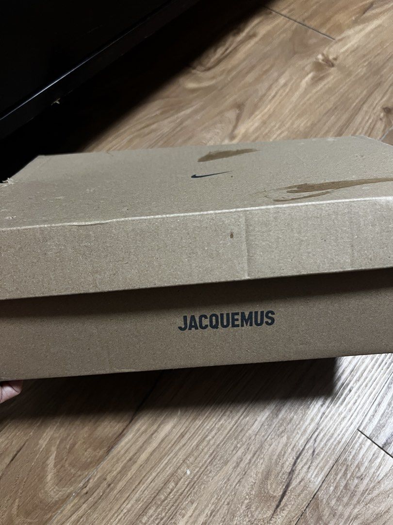 Nike Air Humara LX Jacquemus (Category: Sneakers) located in Manila. Submitted by binigurrl (Listing ID 1436044829, Image 2). Description: - Nike Air Humara LX sneakers - Colorway: Light bone/gold-sail - Size: US 5.5, UK 3, EUR 36, 22.5 cm - Features white and beige design with black accents - Includes original box with Jacquemus logo.