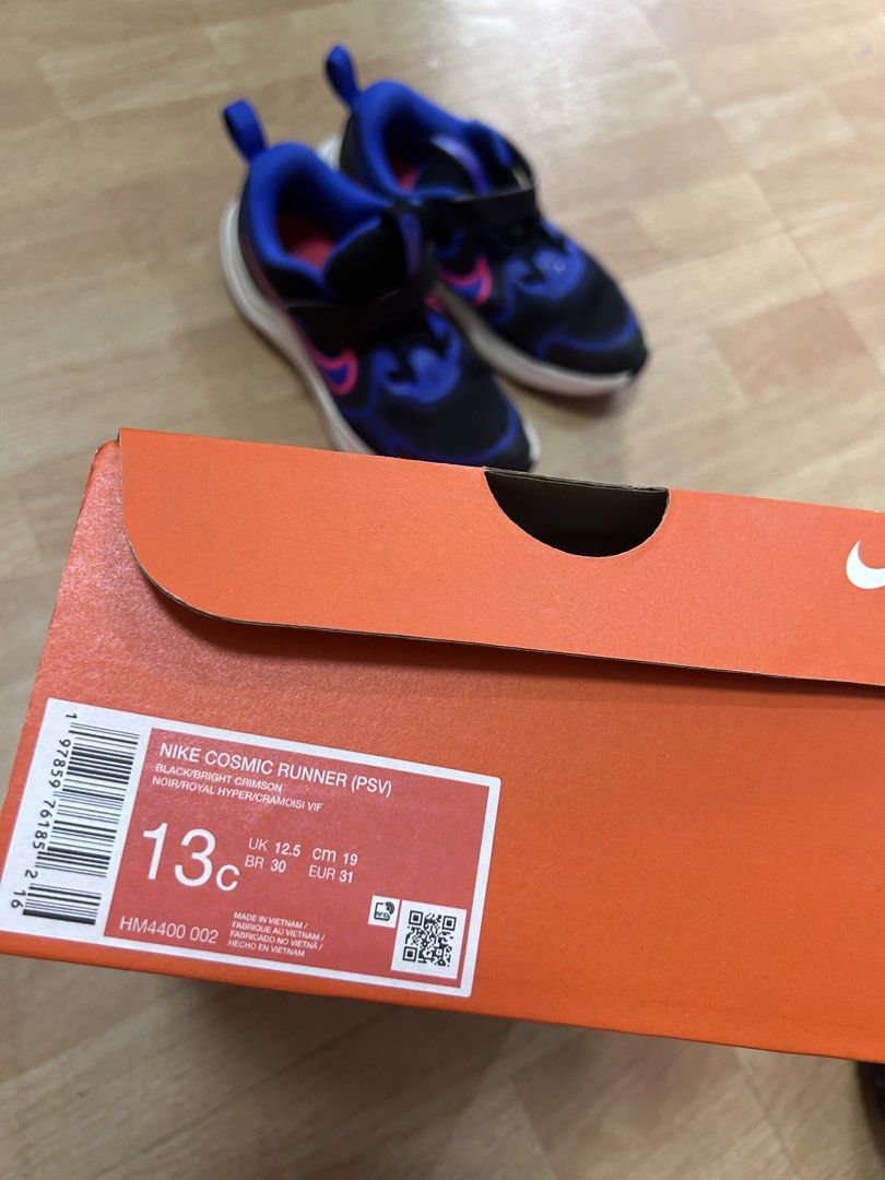 Nike Cosmic Runner (PSV) Kids Shoes (Category: Babies & Kids Fashion) located in Del Monte. Submitted by cheezy_aissa (Listing ID 1435940895, Image 3). Description: - Nike Cosmic Runner (PSV) kids shoes - Color: Black and Blue - Size: 13C - Easy on/off hook-and-loop strap - Includes original box - Made in Vietnam - Features a bright pink accent - Box size details: UK 12.5 cm 19, BR 30, EUR 31.