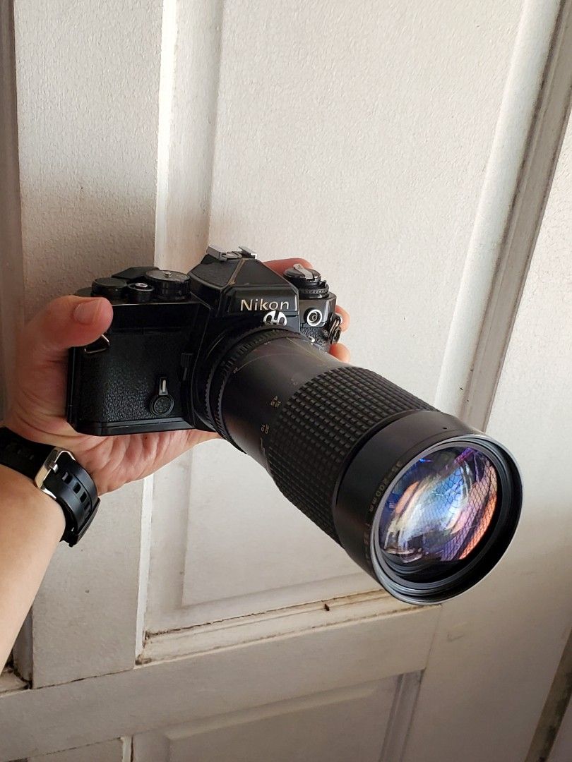 Nikon FE (BLACK) (Category: Cameras) located in Angeles City. Submitted by filmcameradeals. (Listing ID 1436043691, Image 1). Description: Nikon FE Black Beautiful patina with 35-200mm lens As is. I will sell it higher after i CLA'd it. Grab it now! Issue: stuck shutter, dents, viewfinder a bit dirty. Needs CLA. Easy fix. Accurate meter and shutter before it went stuck. No time for CLA. Php.2,899 Shipping LBC cop mode Pampanga meet up.