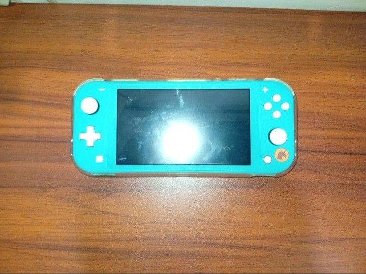 Nintendo Switch Lite Animal Crossing Edition (Category: Other Gadgets) located in Dumaguete. Submitted by joaquin_lucas_cadiz (Listing ID 1436079225, Image 1). Description: Lightly Used Nintendo Switch Lite Animal Crossing Edition - Turquoise color - Includes console, charger, and case - Perfect for on-the-go gaming.