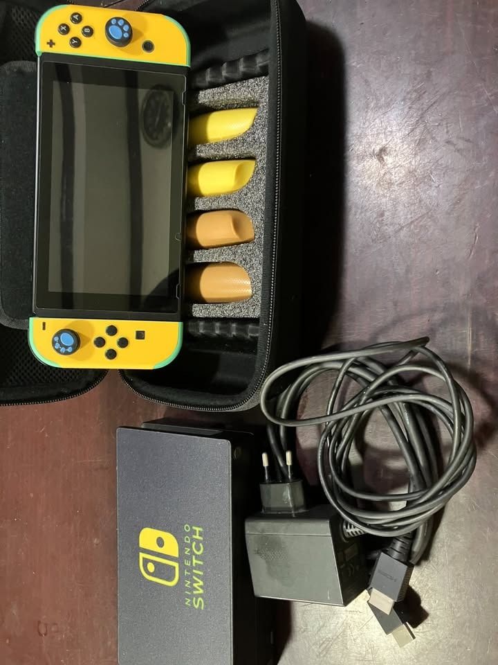 Nintendo Switch Pro Controller (Category: Controllers) located in Marikina City. Submitted by lasgna (Listing ID 1436063335, Image 1). Description: FOR SALE AS A BUNDLE ONLY - Nintendo Switch Pro Controller - Unique black and white design - Includes a carrying case - Standard button layout - Analog sticks - USB-C charging port Issues: - Left Joycon connection issues - Cosmetic Issue No other issues. Payment via Gcash, Maya, Gotyme Buyer shoulders