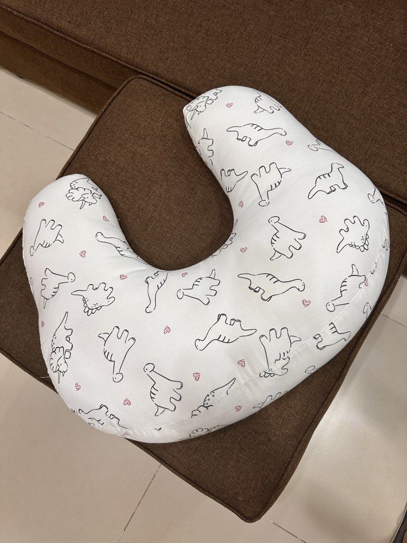 Nursing Pillow with free pillow cover (Category: Breastfeeding & Bottle Feeding) located in Mandaluyong City. Submitted by abbysscloset (Listing ID 1436055787, Image 1). Description: • Nursing pillow for breastfeeding. • 2 free pillow cover • Still in good condition • No issues.
