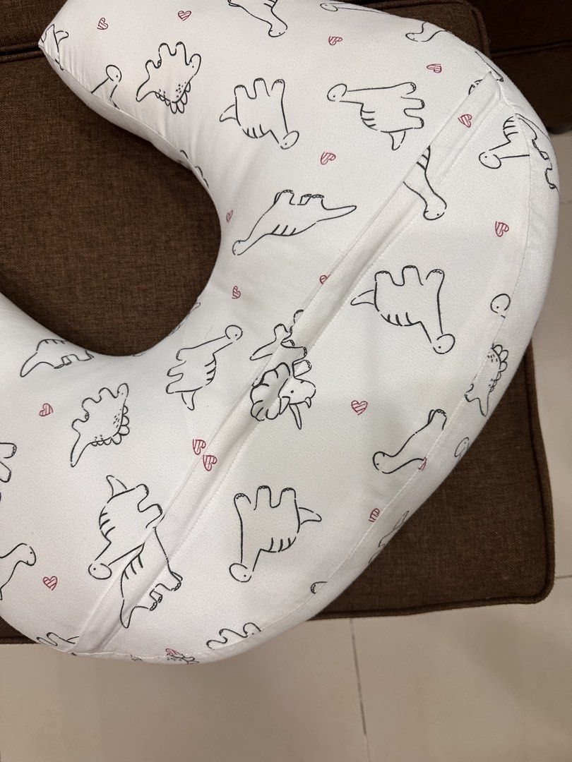Nursing Pillow with free pillow cover (Category: Breastfeeding & Bottle Feeding) located in Mandaluyong City. Submitted by abbysscloset (Listing ID 1436055787, Image 3). Description: • Nursing pillow for breastfeeding. • 2 free pillow cover • Still in good condition • No issues.
