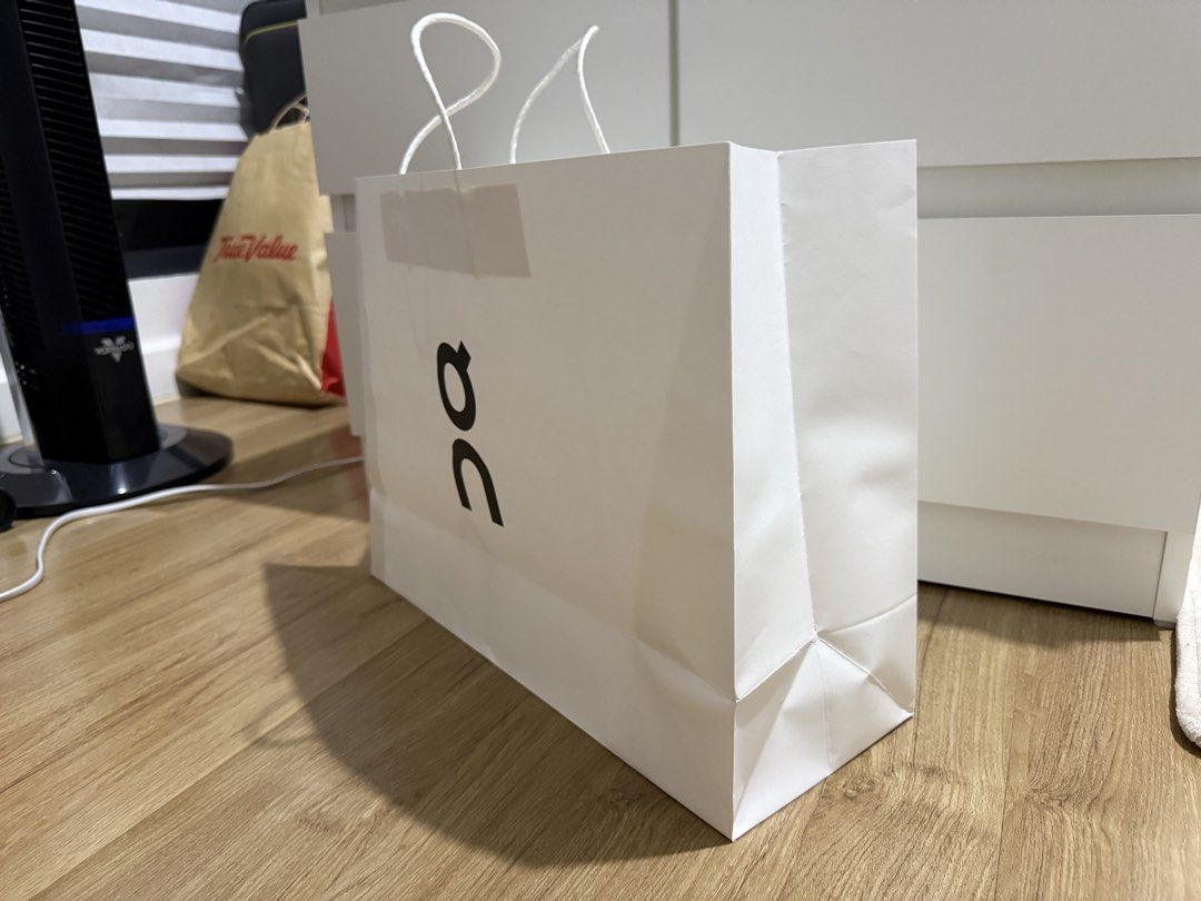 On Running Paper Bag (Category: Craft Supplies & Tools) located in Valenzuela. Submitted by minami34 (Listing ID 1436026895, Image 2). Description: - Official On Running paper bag - Features the brand's logo - Includes paper handles - Color: White Dimensions: (L- 40.4cm x W- 31cm x D - 15.2cm) Reason for selling: Declutter Note: Shipping Fee (SF) still not included. Mode of Payment: Bank Transfer (BDO/BPI) or GCash Delivery Partner: JnT or LBC (d