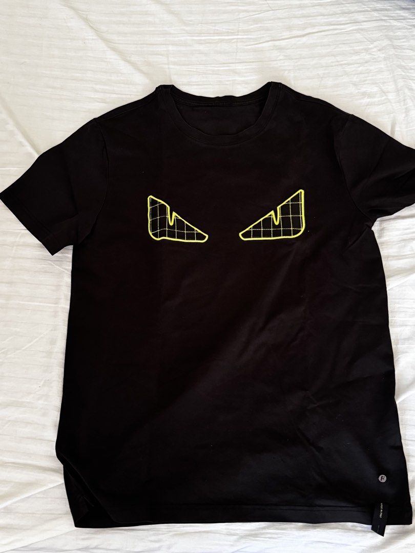 Original Fendi Shirt (Category: Tshirts & Polo Shirts ) located in Cavite. Submitted by candymuncher (Listing ID 1436081600, Image 1). Description: - Original Fendi T-shirt - Size: L - Color: Black - Features the iconic Fendi eyes design - Made in Italy - Condition: Good - Meetup: SM City Dasmariñas - Shipping: LBC/LALAMOVE (buyer's responsibility).