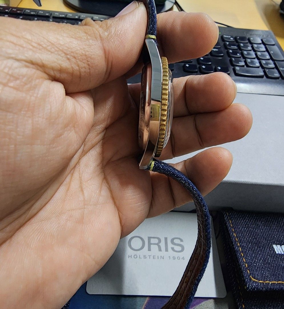 Oris X Momotaro Divers Sixty-Five Watch (Category: Luxury Watches) located in Taguig. Submitted by masterbert (Listing ID 1435994747, Image 2). Description: RARE/SLIGHTLY USED CONDITION for sale/trade Technical Details Reference Number 01 733 7707 4337-Set Case Multi-piece stainless steel/bronze case, minutes scale top ring. Sapphire, domed on both sides, anti-reflective coating inside. Stainless steel, special engravings, screwed. 40.00 mm Size 