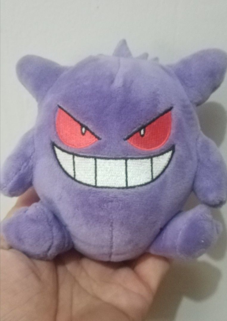 Pokemon Center Gengar Plush (Category: Plushies & Soft Toys) located in Bulacan. Submitted by renasophiatoystore2020 (Listing ID 1435916423, Image 1). Description: - Authentic Gengar plush from Pokemon Center - Features Gengar's iconic purple color and grin - Soft and huggable material - Ideal for Pokemon fans of all ages - Makes a great gift or addition to your collection.