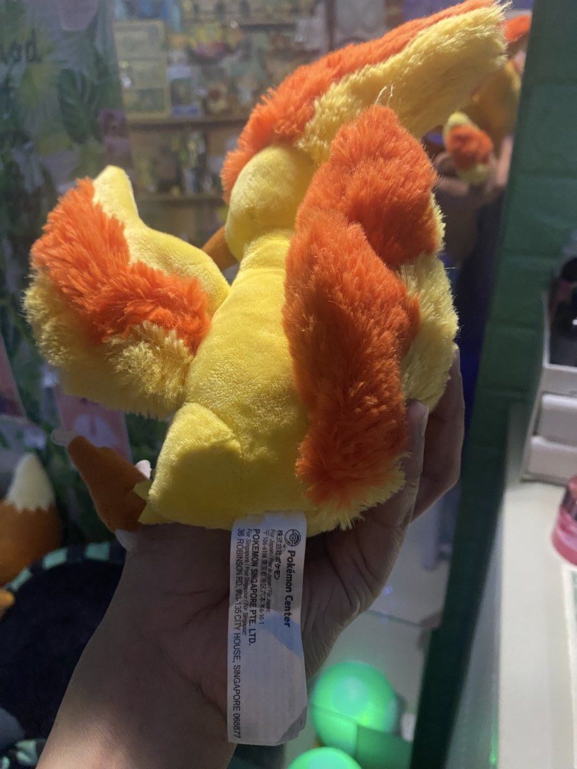 Pokemon Fit Moltres Plush Toy (Category: Plushies & Soft Toys) located in Manila. Submitted by jongamba0773283 (Listing ID 1436092284, Image 2). Description: - Pokemon Center Moltres plush. - Features bright yellow and orange colors. - Detailed wings and fiery crest. - Comes with a tag. - Great for Pokemon fans and collectors..