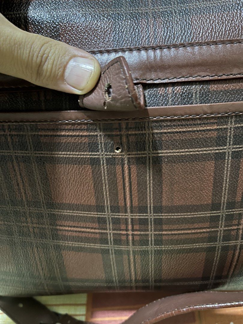 Polo Ralph Lauren Plaid Shoulder Bag (Category: Luxury Bags & Wallets) located in Manila. Submitted by jankbaiteh05162 (Listing ID 1435917331, Image 3). Description: - Polo Ralph Lauren shoulder bag - Plaid pattern - Leather material - Flap closure with two buckles - Front pocket - Adjustable shoulder strap - Features a small logo plate - Shows wear on strap and closure.