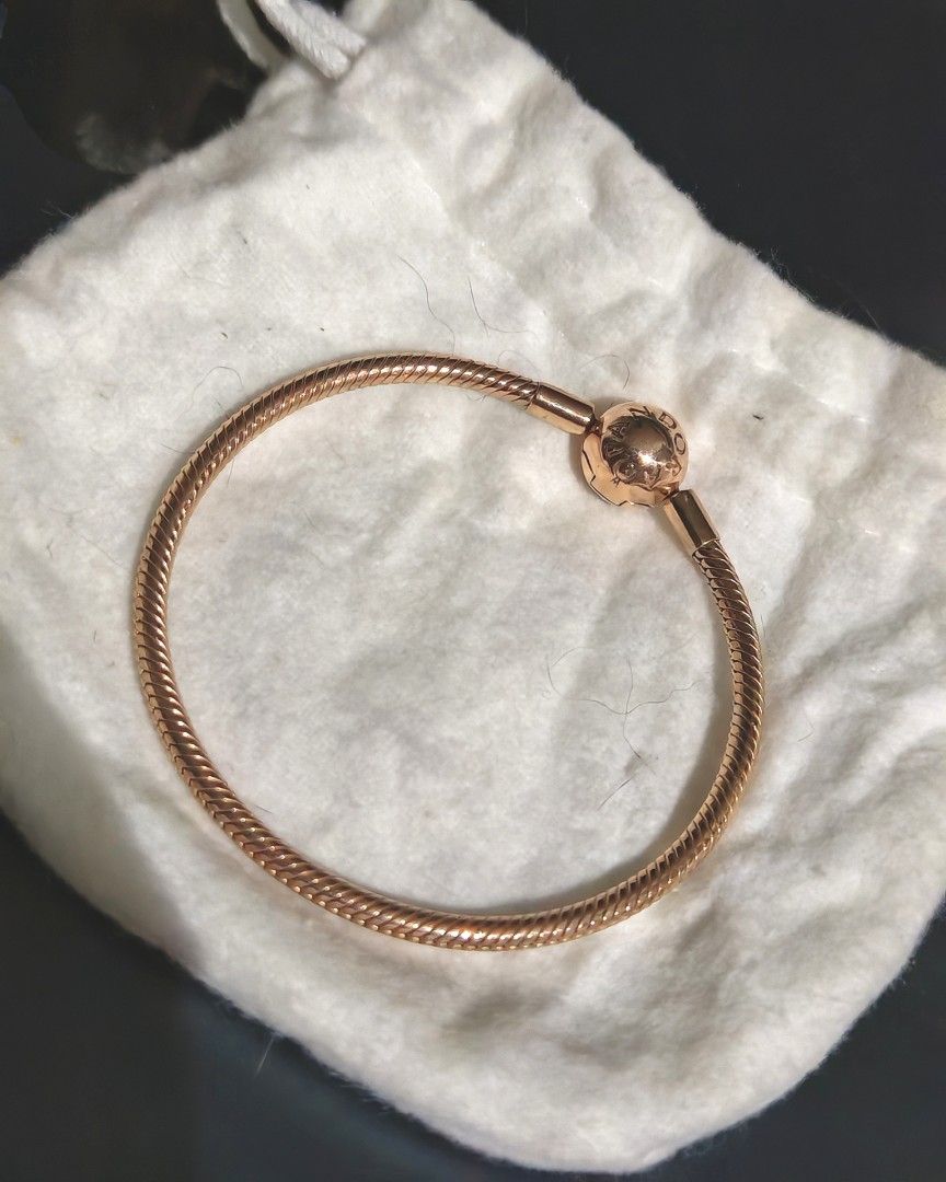 Authentic Pandora Rose Gold Snake Chain Bracelet (Category: Bracelets) located in Taguig. Submitted by nalalitaloco (Listing ID 1435981762, Image 1). Description: Pandora rose gold snake chain bracelet, authentic, no receipt as this was given as a gift to me. You can add your charms, clips, or wear it on its own for a simple, understated look. Stack it with contrasting bracelets for a fun play on textures. - Features a round clasp with the Pandor