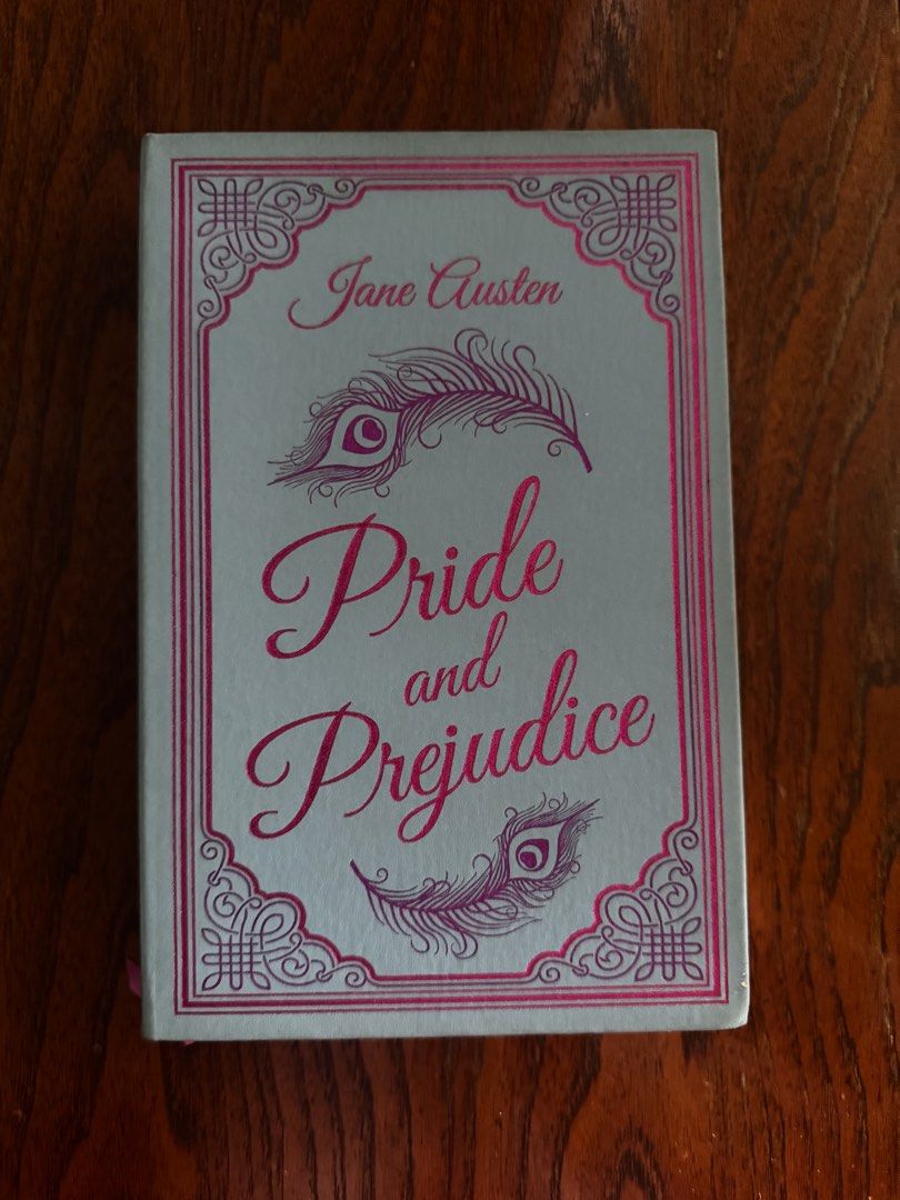 Pride and Prejudice by Jane Austen (Category: Storybooks) located in Pasig City. Submitted by lovedpicks (Listing ID 1435933475, Image 1). Description: - "Pride and Prejudice" by Jane Austen - Decorative cover with peacock feather design - Includes ribbon bookmark - Published by Paper Mill Press.