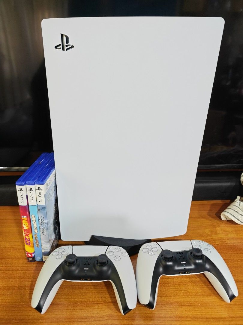 PS5 disk version with 2 controller. (Category: PlayStation) located in Singapore. Submitted by -kurisu- (Listing ID 1436057022, Image 1). Description: underutilized PS5 disk version include 2 original controller. 3 games..
