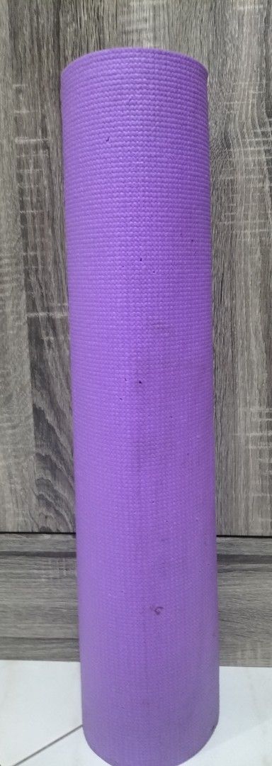 Purple Yoga Mat (Category: Exercise Mats) located in Las Pinas. Submitted by declutter.with.eca (Listing ID 1435914916, Image 2). Description: - Purple yoga mat - Made of foam-like material - Ideal for exercise and stretching.