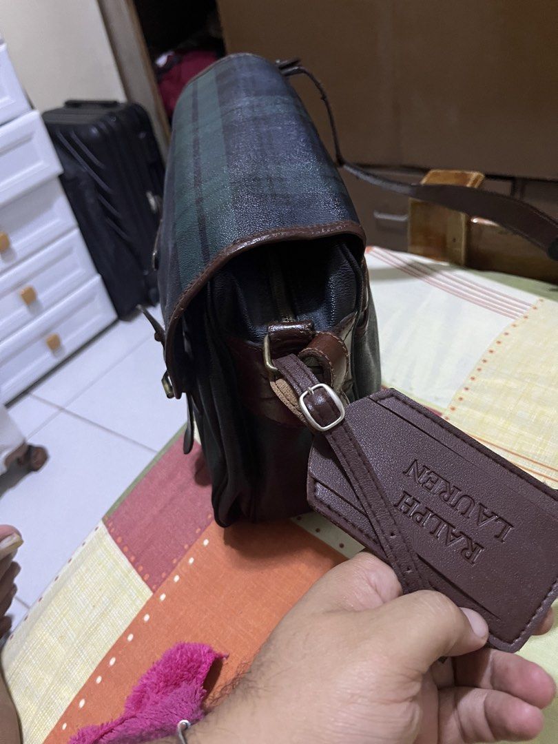 Ralph Lauren Plaid Messenger Bag (Category: Luxury Bags & Wallets) located in Manila. Submitted by jankbaiteh05162 (Listing ID 1435917457, Image 3). Description: Strap need replacement strap no good but can still used - Ralph Lauren messenger bag - Plaid pattern - Flap closure with buckle straps - Leather luggage tag - Brown leather trim - Shoulder strap - Ralph Lauren logo on front.