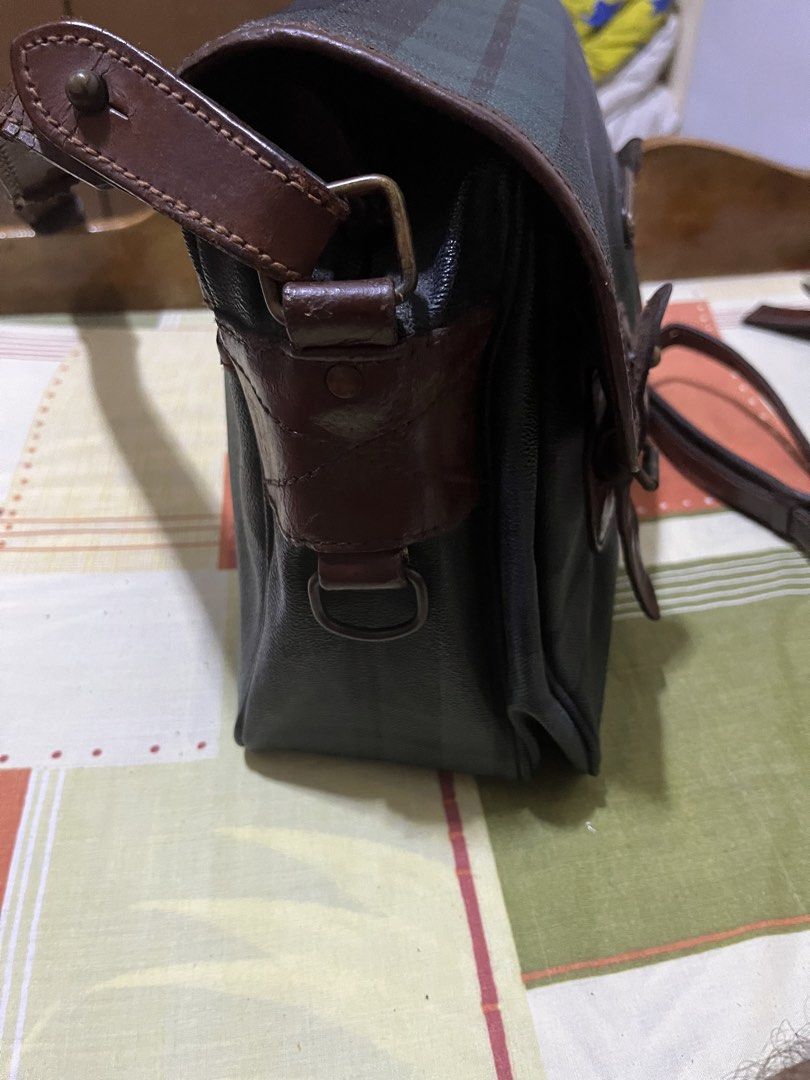 Ralph Lauren Plaid Messenger Bag (Category: Luxury Bags & Wallets) located in Manila. Submitted by jankbaiteh05162 (Listing ID 1435917457, Image 2). Description: Strap need replacement strap no good but can still used - Ralph Lauren messenger bag - Plaid pattern - Flap closure with buckle straps - Leather luggage tag - Brown leather trim - Shoulder strap - Ralph Lauren logo on front.