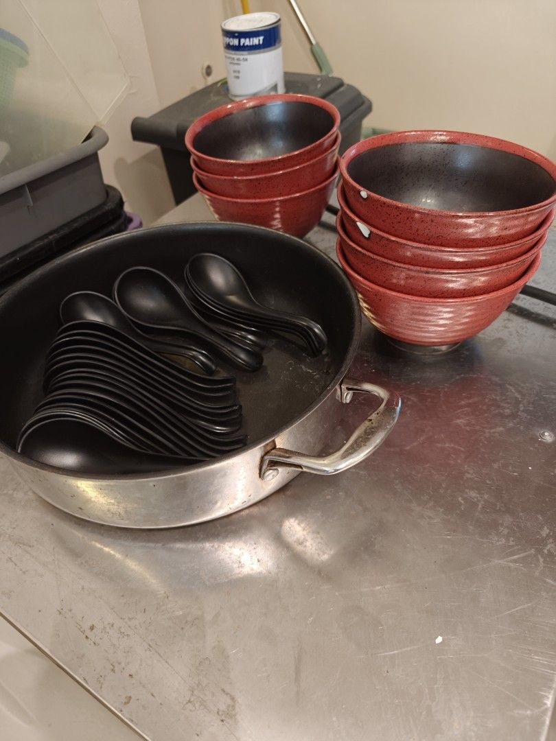Red Ceramic Bowls and Black Spoons Set