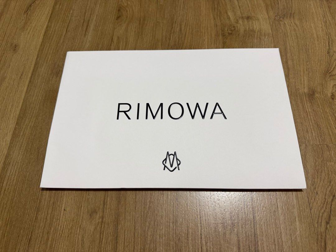 Rimowa Shopping Bag (Category: Craft Supplies & Tools) located in Valenzuela. Submitted by minami34 (Listing ID 1436029380, Image 1). Description: - Brand new Rimowa shopping bag. - Crisp white color. - Features the iconic Rimowa logo (Embossed) - Rectangular shape with a folded bottom. - Unused condition. Dimensions: (L- 32.1cm x W- 20.7cm x D - 10.5cm) Reason for selling: Declutter Note: Shipping Fee (SF) still not included. Mode of Payment: Ba