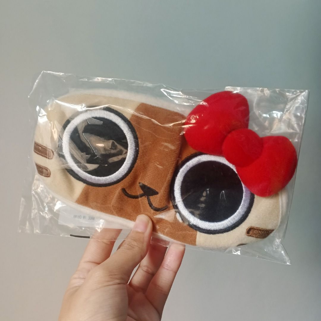 Sanrio Hello Kitty x Monster Hunter Sleeping Mask (Category: Face Care) located in Noveleta. Submitted by forgetti00 (Listing ID 1435918796, Image 1). Description: Unused - Adorable cat eye mask design - Features big eyes and a red bow - Blocks out light for restful sleep - Soft and plush material for comfort - Ideal for travel or everyday use - Brand new, still in original packaging.