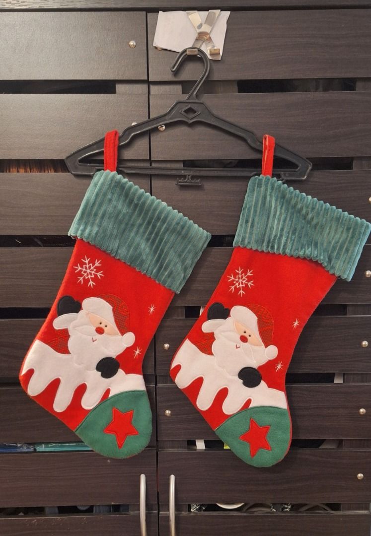 SANTA Christmas Stockings (Category: Other Home Decor) located in General Trias. Submitted by aeunice (Listing ID 1436037762, Image 1). Description: 2 pieces available. In Good Condition. Set of two Christmas stockings featuring Santa Claus design. Ready to be hung with a red loop. Meet up / Shipping via Lalamove, JnT, Gogo Express & LBC..