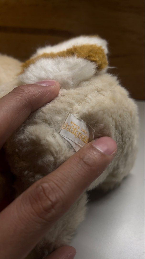 Sekiguchi Monchhichi Tanuki Plush Toy (Category: Plushies & Soft Toys) located in Paranaque City. Submitted by btslite (Listing ID 1436063286, Image 3). Description: - Height 7.5” - Adorable Sekiguchi Monchhichi plush toy. - Dressed as a cute Tanuki. - Features a soft, fluffy exterior. - Comes with a brown and white striped tail. - Classic Monchhichi face with closed eyes and red mouth. - Wearing a Tanuki hood. - Sekiguchi tag is visible. ⚠️ Cond