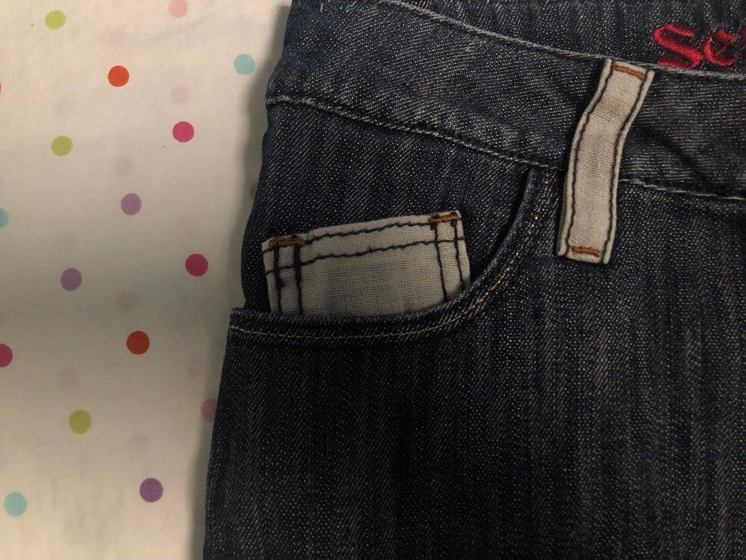 Series II Denim Skirt (Category: Skirts) located in Alcala. Submitted by grisch (Listing ID 1435923878, Image 3). Description: - Series II denim skirt - Dark wash - Classic five-pocket design - Raw hem - Button and zipper closure - Series II logo on waistband - Red tag on back pocket.