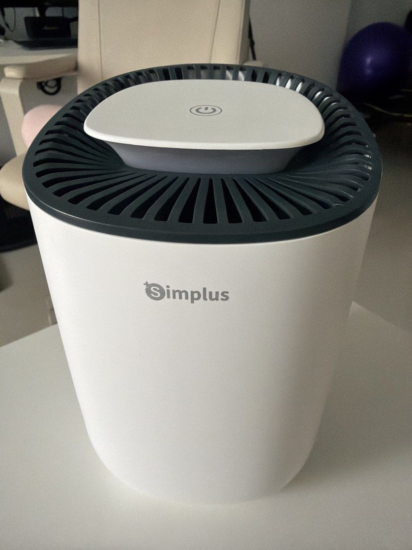 Simplus Dehumidifier (Category: Air Purifiers & Dehumidifiers) located in Singapore. Submitted by d5th2013 (Listing ID 1435947028, Image 1). Description: Bought during sale at S$45+. Upgrading now, so letting this go at just a fraction of the cost — great deal for anyone looking for a compact dehumidifier..