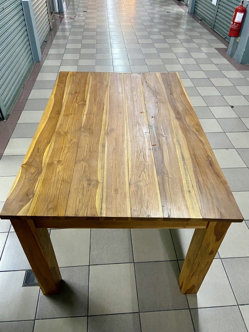 Solid Wood Dining Table (Category: Tables & Sets) located in Kuala Lumpur. Submitted by preloved-c (Listing ID 1435957242, Image 1). Description: - Solid wood dining table - Rectangular tabletop with natural wood grain - Dimensions: 180cm (L) x 80cm (W) x 75cm (H) - Features four square legs - Ideal for dining or workspace.