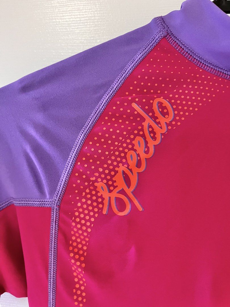 Speedo Rash Guard - Pink and Purple (Category: Babies & Kids Fashion) located in Quezon City. Submitted by junkstar2020 (Listing ID 1435951185, Image 2). Description: - Speedo rash guard - Eye-catching pink and purple design - Short sleeves - High neckline - UPF 50 sun protection - Speedo logo on front - Made of stretchy, athletic material Great condition no stretching or fading.