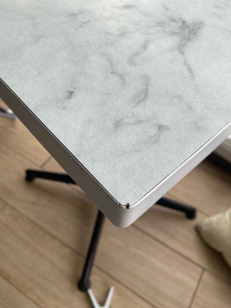 Square table (Category: Tables & Sets) located in Singapore. Submitted by plasticfuentes (Listing ID 1435921794, Image 3). Description: - Square table with marble-look top - Black metal legs - Perfect for small spaces or side table - Sturdy and functional - self pick up .