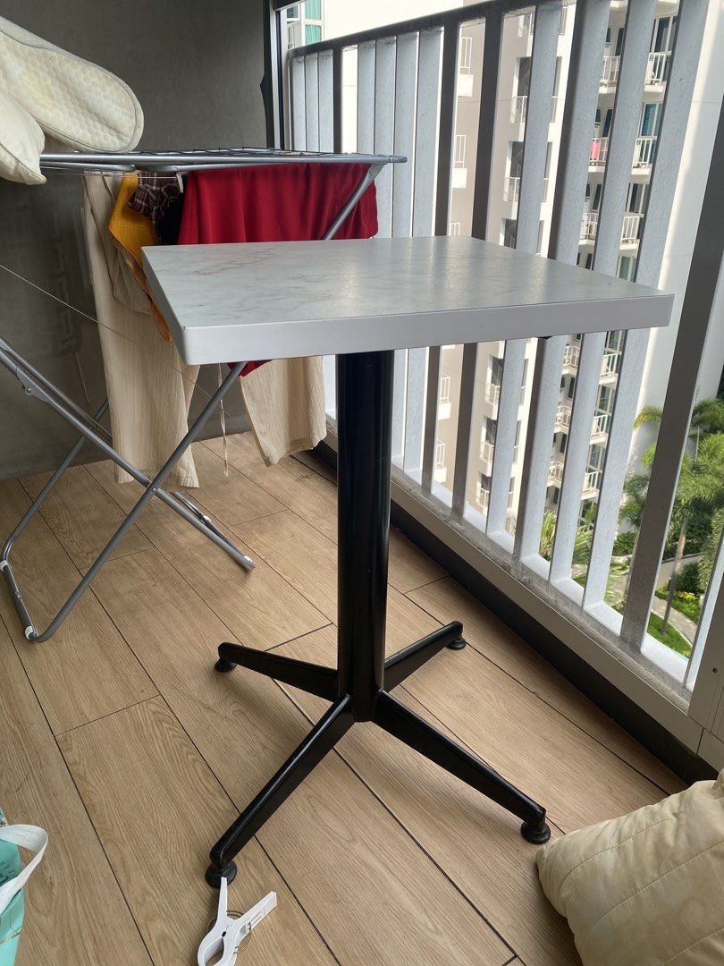 Square table (Category: Tables & Sets) located in Singapore. Submitted by plasticfuentes (Listing ID 1435921794, Image 1). Description: - Square table with marble-look top - Black metal legs - Perfect for small spaces or side table - Sturdy and functional - self pick up .