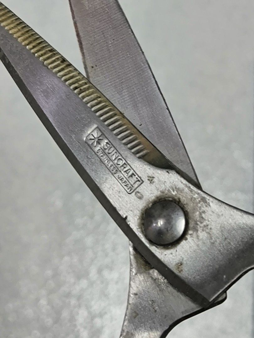 Suncraft Stainless Japan Kitchen Shears (Category: Other Kitchenware & Tableware) located in Angeles City. Submitted by yellowbrickstore (Listing ID 1435937601, Image 3). Description: - Authentic Suncraft kitchen shears, crafted in Japan. - Durable black handle with integrated bottle opener and nutcracker. - Serrated blade design for enhanced cutting performance. - Convenient 20cm length. - Features the Suncraft logo for guaranteed quality. shipp