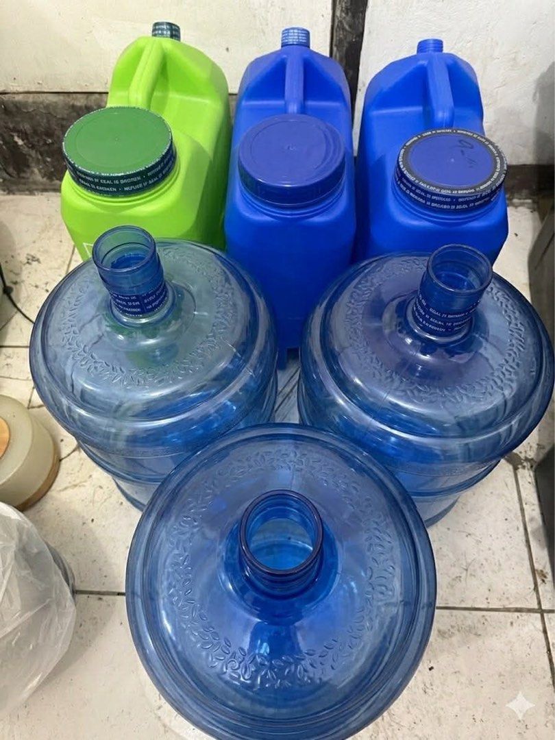 TAKE ALL!! Water Jugs and Containers (Category: Water Bottles & Tumblers) located in Bulacan. Submitted by abchron (Listing ID 1435919210, Image 2). Description: - Assorted water containers - Includes large blue water jugs - Also includes smaller green and blue containers - All containers are empty - Perfect for storing water or other liquids - Ideal for home or business use - Available for pickup or delivery.